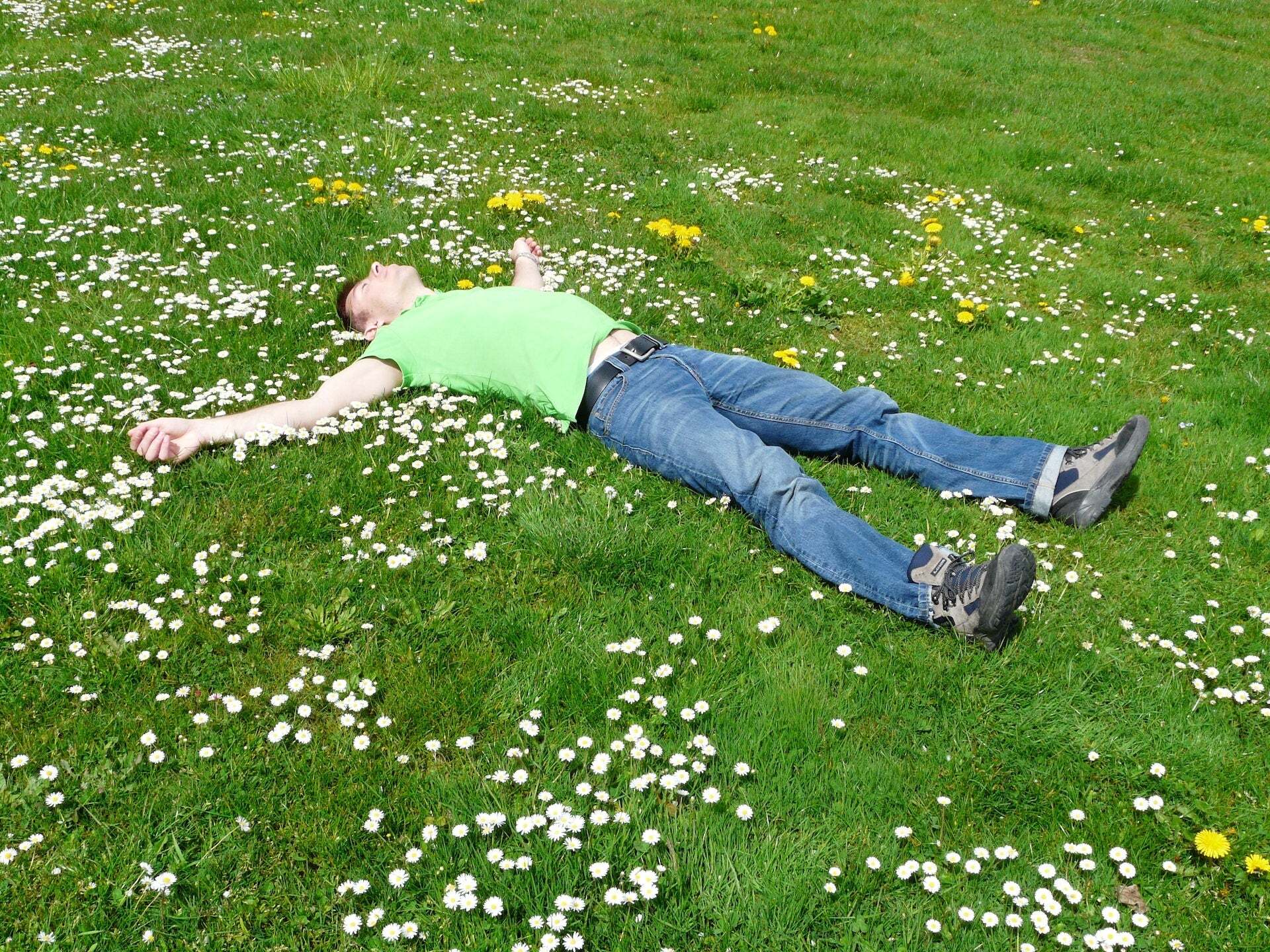 Man lying down on the grass