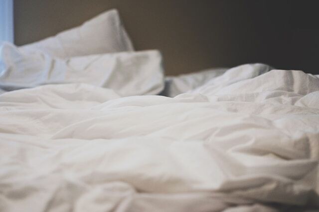 white bed sheets on bed white bed sheets on bed